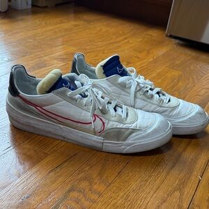 Nike Men’s White Sneakers with Red Swoosh and Blue Tongue